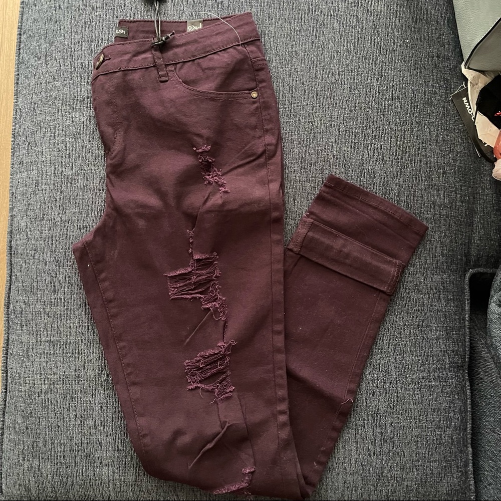 Dark ripped denim jeans